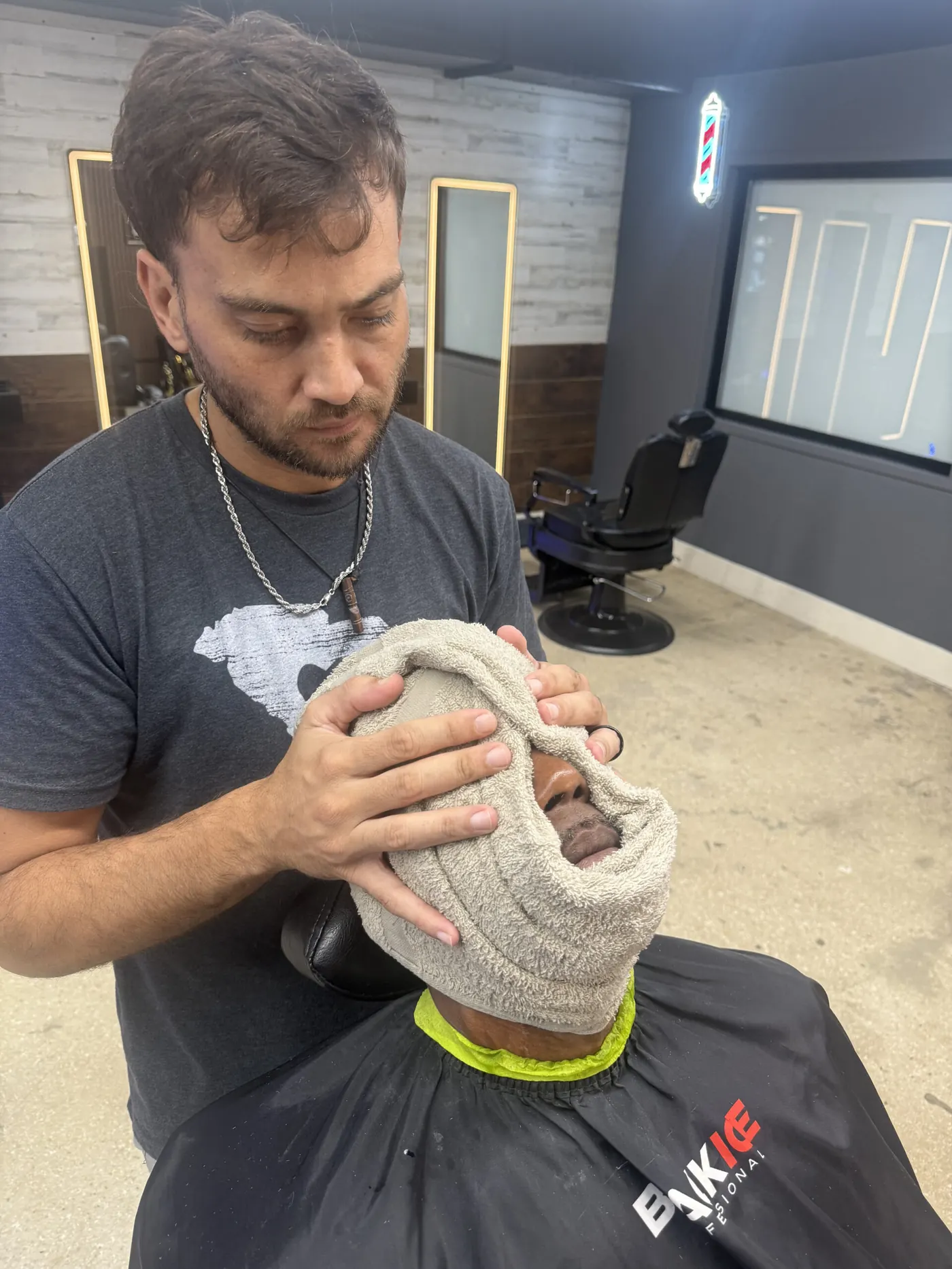 Hot towel razor shave treatment by Nacho at Funking Barber Hollywood FL